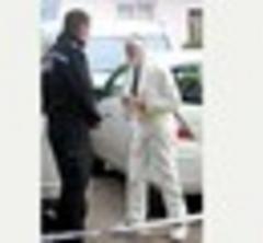 Death of GP: Woman is held